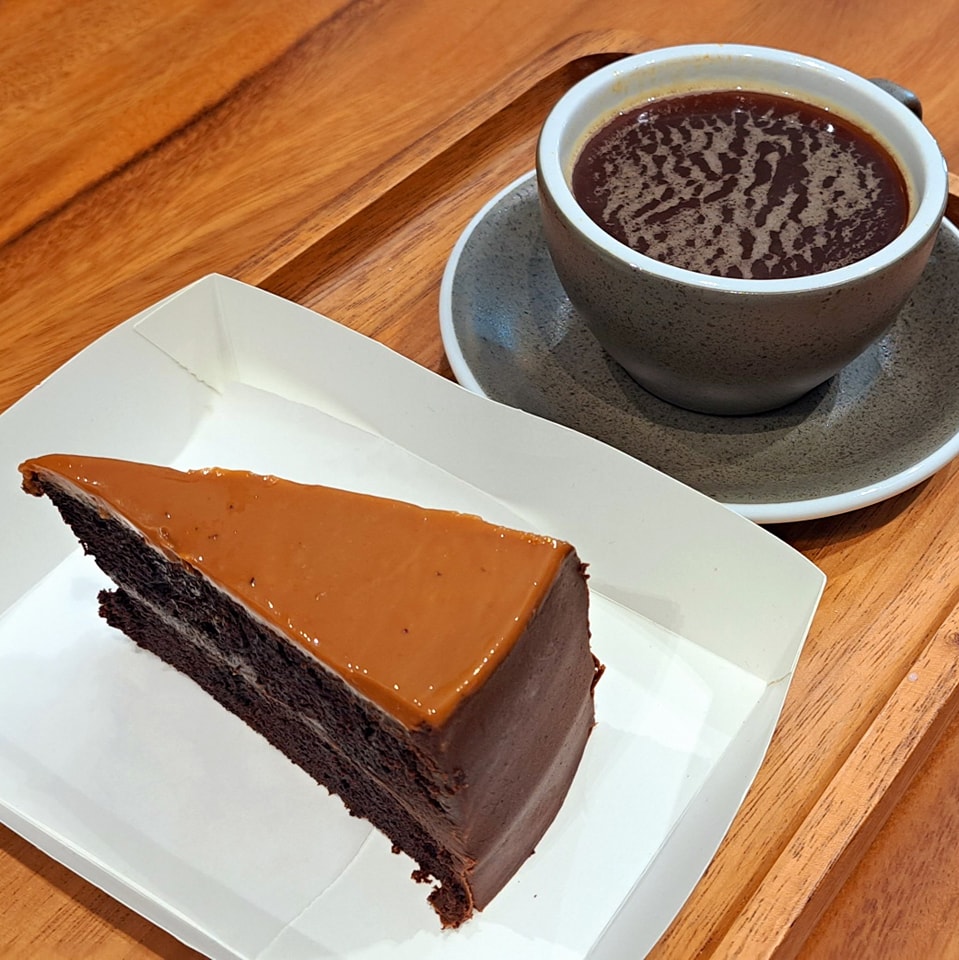 drip cafe coffee and chocolate cake